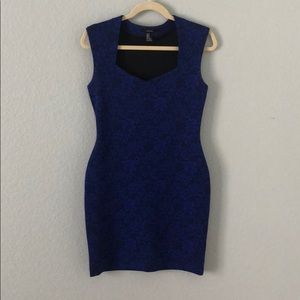 Body flattering dress. Black & blue floral pattern